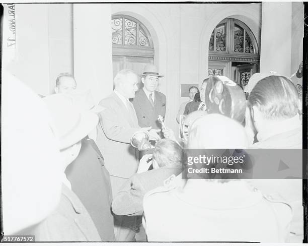 Molotov Talks to Reporters After Seeing Dulles. Geneva, Switzerland: Soviet Foreign Minister V.M. Molotov, left, and Andre[y ]Gromyko, center, talk...