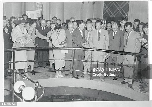 Moscow, U.S.S.R.: Tito Sees Soviet's Atomic energy Pavilion. Soviet leaders accompanied Yugoslav President and Mme. Tito to the all-union...