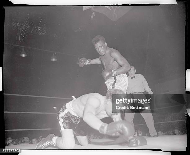 Washington, D.C.: Johnny Williams goes down for the first of two times in the third round at the hands of Tommy Jackson. The ex-British Empire...