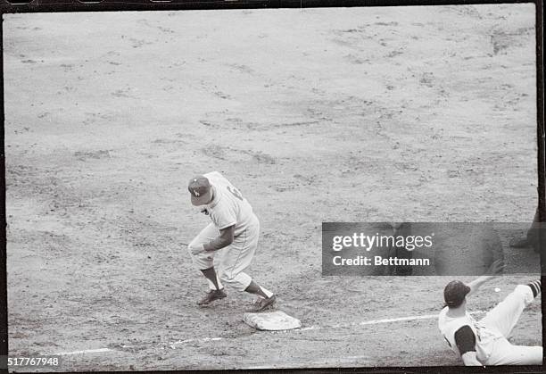 Pittsburgh, Pennsylvania: Dodgers' Ron Fairly with a great catch makes an out on Pirate thirdbaseman, Don Hoak, in the fourth inning of the first of...