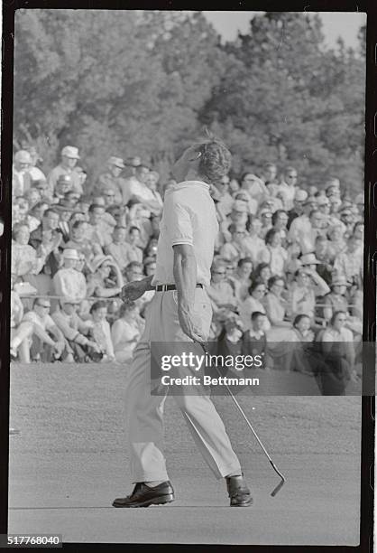 Arnold Palmer, winner of the 1962 Masters tournament in a playoff 4/9 with Dow Finsterwald and Gary Player, emotes on the 18th green as his putt for...