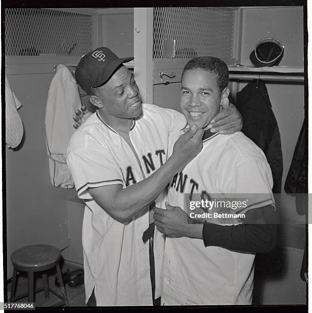 Heroes of the San Francisco Giants' 6-0 season opener victory over the Milwaukee Braves is shown here, as they congratulate one another in dressing...