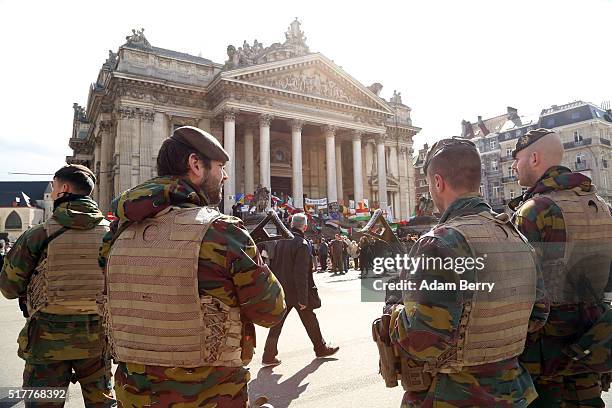 Belgian soldiers patrol Place de la Bourse on March 27 in Brussels, Belgium. Days after suicide bomber attacks at Brussels Zaventem airport and...