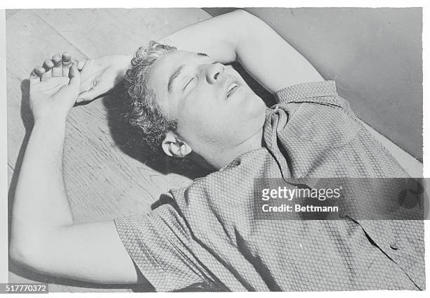 Asleep in the Deep. Hollywood, California... Asleep on a bench at Hollywood Police Station is Charles Spencer Chaplin actor and son of the film...