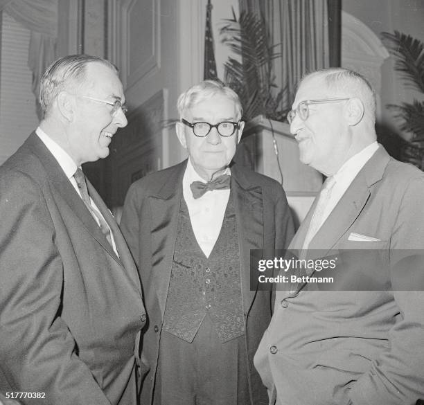 Washington: Lyle C. Wilson , Washington general manager and vice president of the United Press International, chats with William D. Hassett , former...