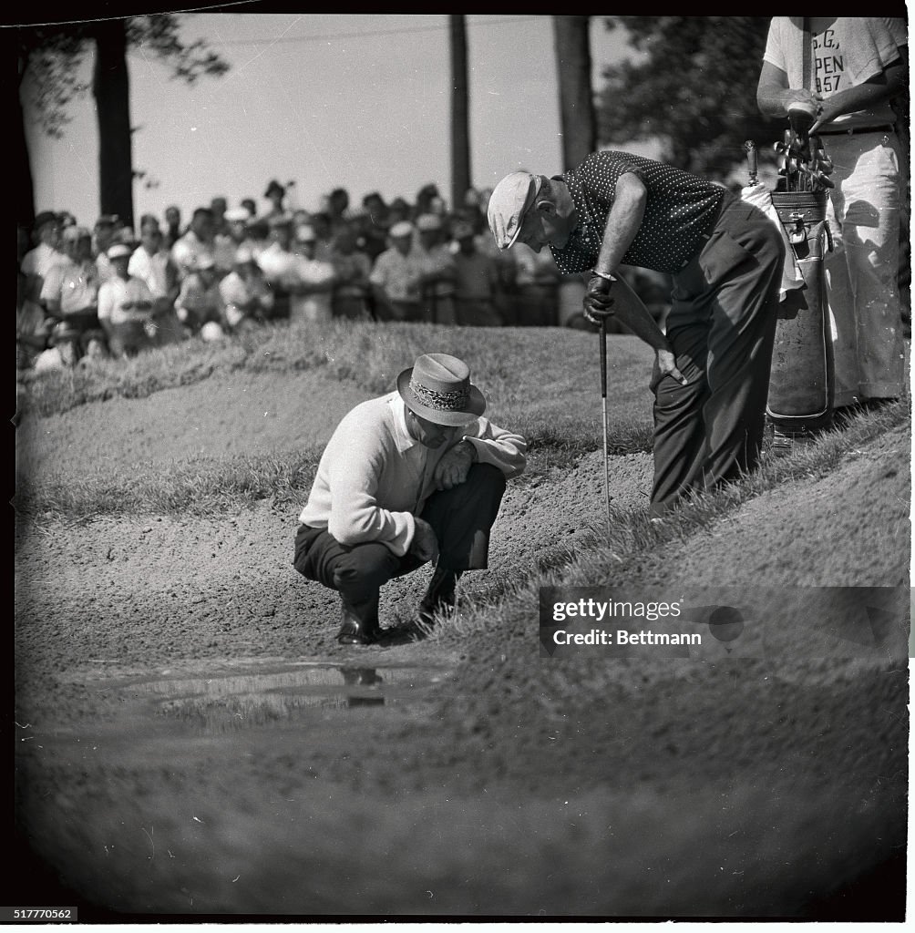 Sam Snead Examining Golf Ball Embedded in Course