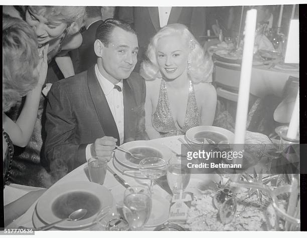 Band leader Ray Anthony and his actress wife, Mamie Van Doren, are shown at the Thalians' annual dinner dance and show in the Grand Ballroom of the...