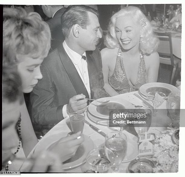 Band leader Ray Anthony and his actress wife, Mamie Van Doren, are shown at the Thalians' annual dinner dance and show in the Grand Ballroom of the...