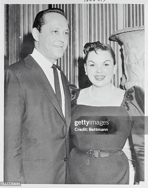 Judy Garland and husband Sid Luft are shown at the reception for the press at Londonderry House. Miss Garland was in London for the opening of her...