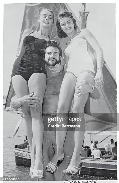 Venice, Italy: Beauties And The Beard. Bearded Steve Reeves of the U. S., otherwise known as "Mr. Universe" is obviously pleased with himself as he...