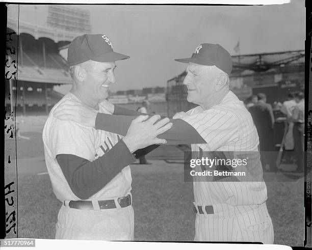 Manager Casey Stengel of the New York Yankees, and manager Al Lopez, of the Chicago White Sox, are shown before their teama clashed at Yankee Stadium...