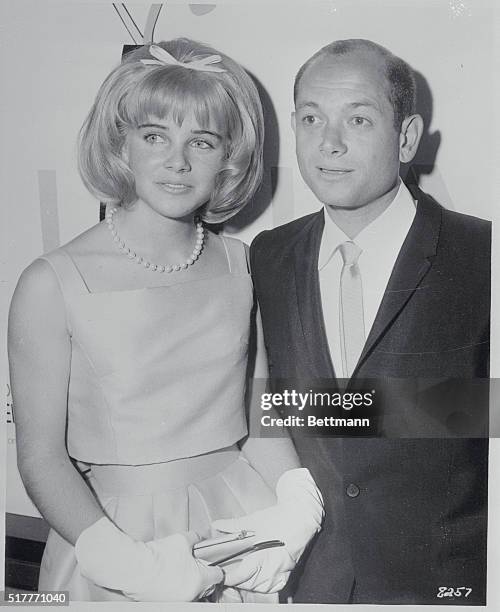 Actress Sue Lyon, who just finished her movie Lolita, is standing with the producer of the film, James B. Harris.