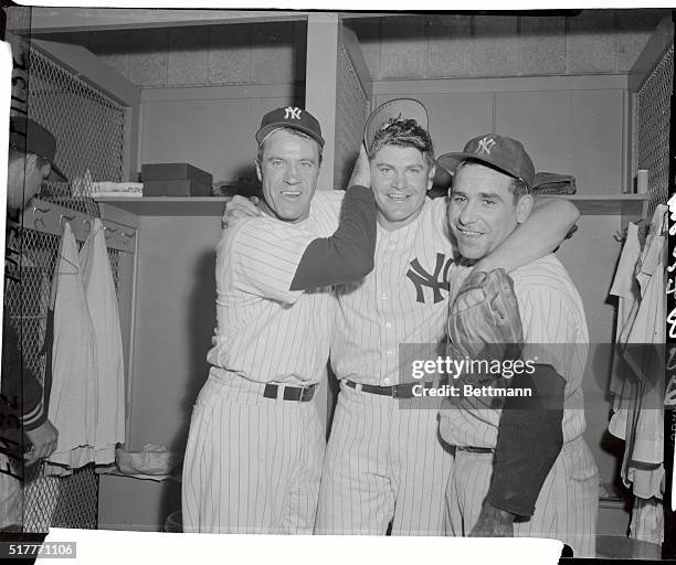 Overjoyed Yankee heroes of the sixth game of the 1957 World Series flash victory smiles after their team's 3-2 win over the Braves had tied the...