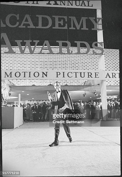 Santa Monica, California: Actor Walter Matthau, winner of the Best Supporting Actor award at the Academy Awards, April 10, leaves the Santa Monica...