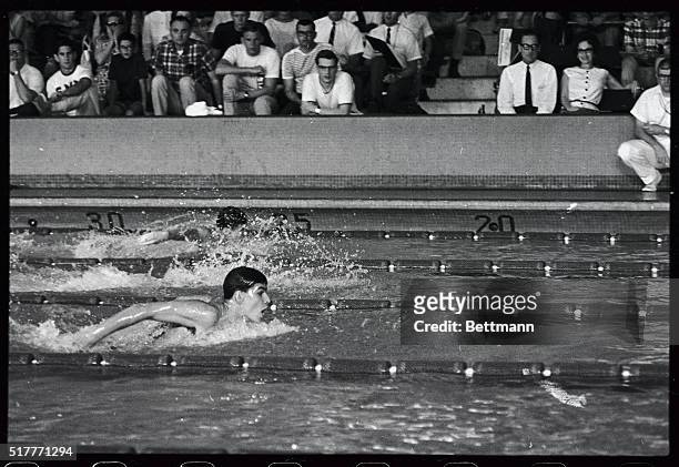 Mark Spitz, a 15-year-old Santa Clara, California, high school junior, leads the pack to set a new American record in the 200-yard butterfly event...