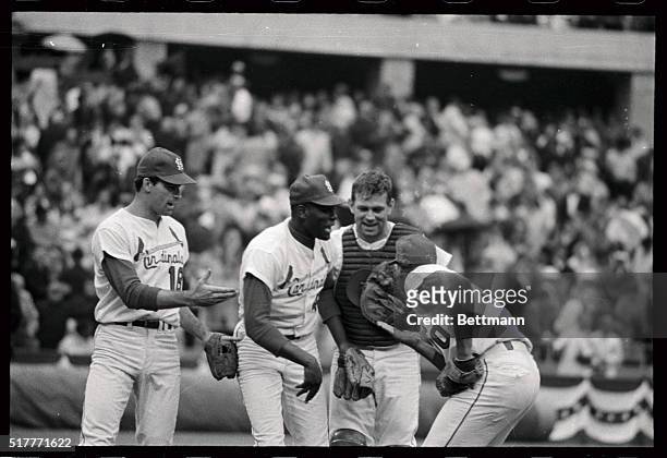 Cards pitcher Bob Gibson is center of attention of Catcher Tim McCarver and Orlando Cepeda after he hurled 6-0 shutout against Boston. Gibson allowed...
