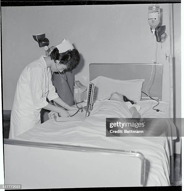 The Lone Survivor. Manila, Philippines: Corazon Amurao, lone survivor of the brutal Chicago massacre of eight students nurses last year checks the...