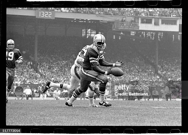 Cleveland defensive back Mike Howell , partially obscured, breaks up a pass play intended for Dallas end Bob Hayes in 4th quarter action. Dallas won,...