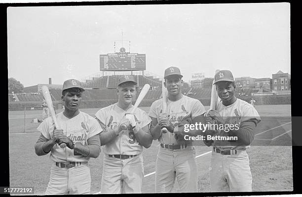 Cardinals "big bats" are shown before game against the Cubs in Wrigley Field here 9/26. From left, Curt Flood, .331; Roger Maris; Orlando Cepeda,...