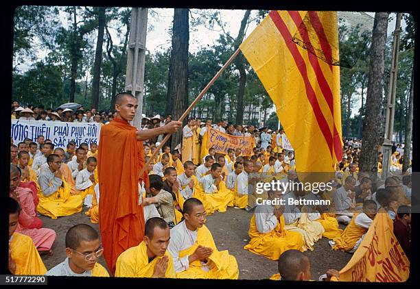 Buddhist monks pray outside the National Palace in effort to express disapproval of the war.