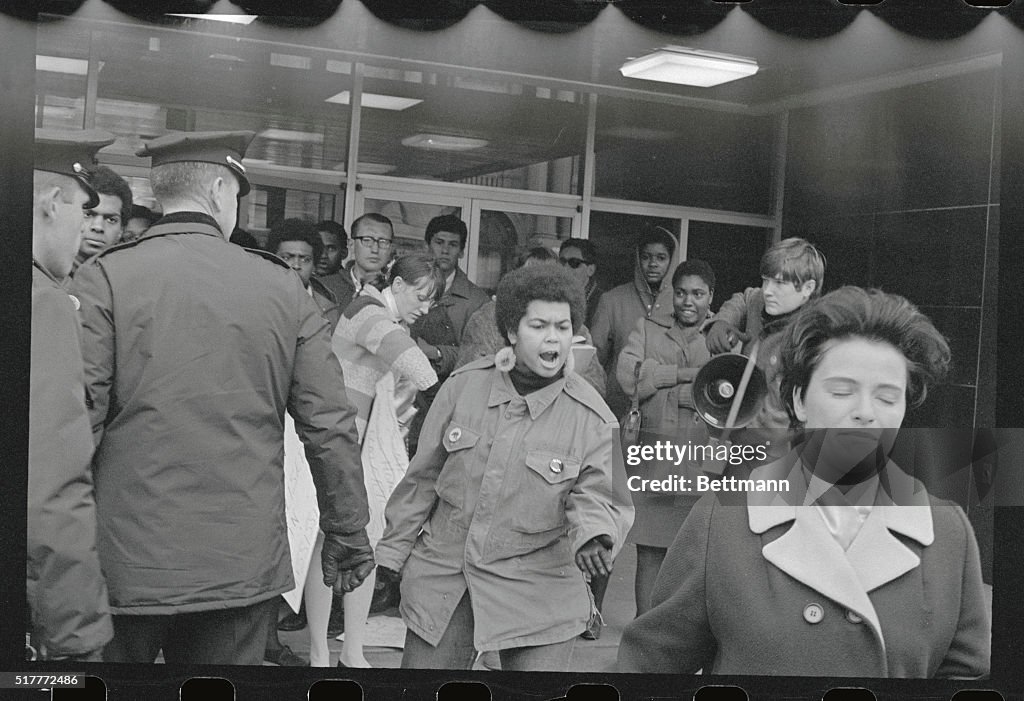 Protester Yelling at Woman