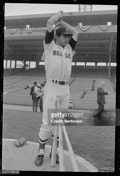 Boston, Massachusetts: Boston Red Sox slugger Carl Yastrzemski flexes his muscles as he hefts bat over his head before batting practice. The Red Sox...