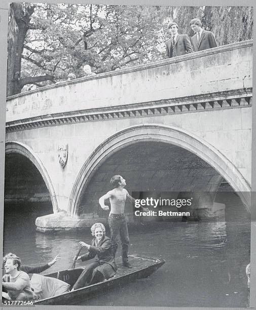 Prince Charles at Cambridge. Cambridge, England: Prince Charles looks down on fellow students punting on the river Cam, shortly after arriving at...