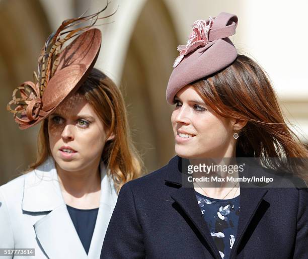 Princess Beatrice and Princess Eugenie attend the traditional Easter Sunday church service at St George's Chapel, Windsor Castle on March 27, 2016 in...