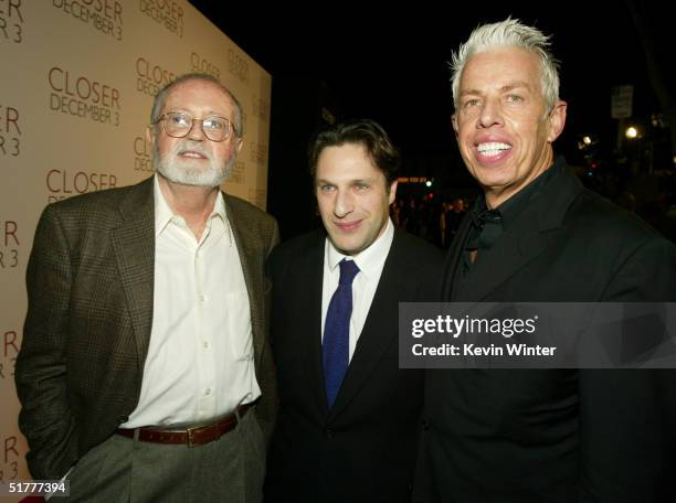 Producer John Calley, screenwriter Patrick Marber and producer Cary Brokaw arrive to the premiere of Columbia Pictures' "Closer" on November 22, 2004...