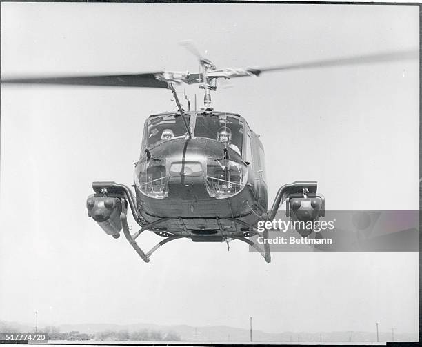 New Helicopter. Culver City, California: Sinister looking helicopter is an Army UH-1B taking off from Hughes Aircraft Co. Flight strip at Culver City...