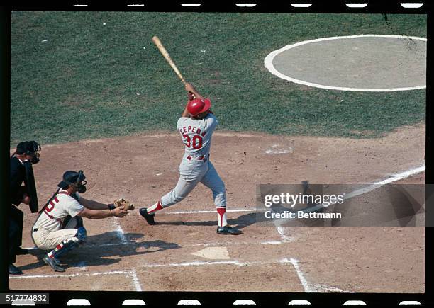 Orlando Cepeda, St. Louis Cardinals 1st baseman, fouls back at bat in 1st inning of World Series opener.