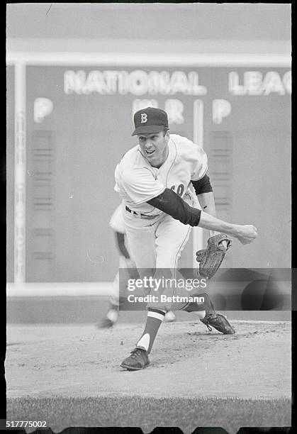 Boston, Massachusetts: Jim Lonborg of the Red Sox, winner of two of the World Series games, throws his first pitch in the 7th and decisive game at...