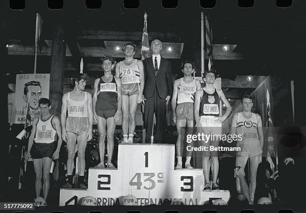 The winners of the 43rd Sao Sylestre Foot Race--the race that annually ushers in the New Year for Sao Paulo's residents--lined up as seen here, on...