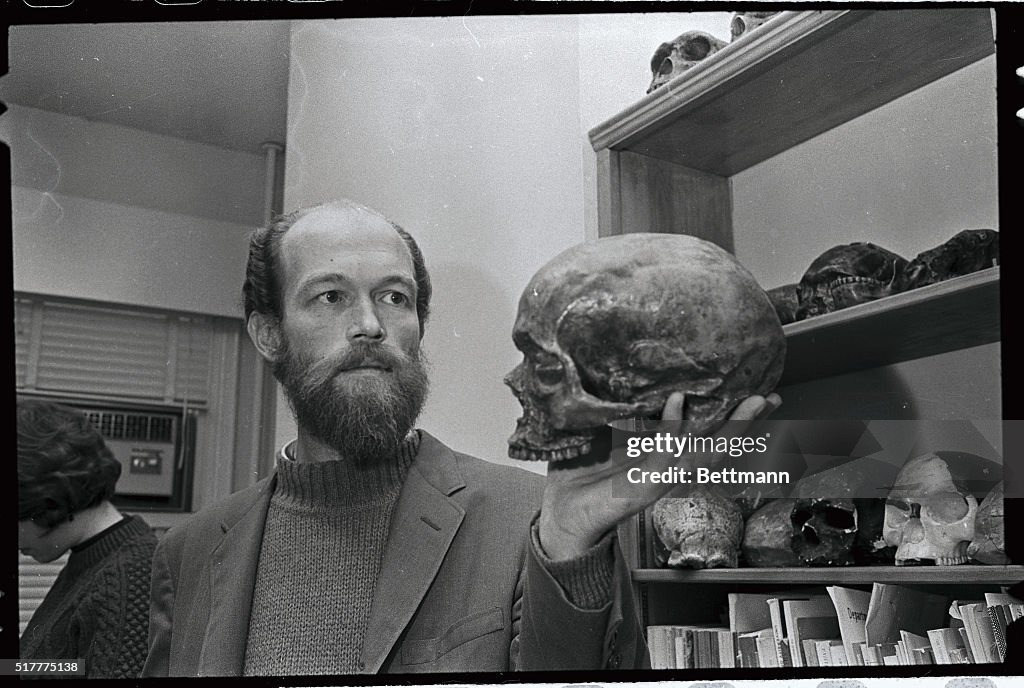 Professor Holding Skull