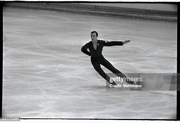 Tim Wood, of Bloomfield Hills, Michigan, does a graceful kick during his free skating performance in the Olympic men's skating event here. Wood, the...