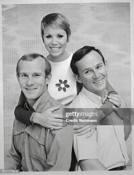 Singer-dancer Judy Carne shown with Tom and Dick Smothers during the Smothers Brothers Comedy Hour on TV.