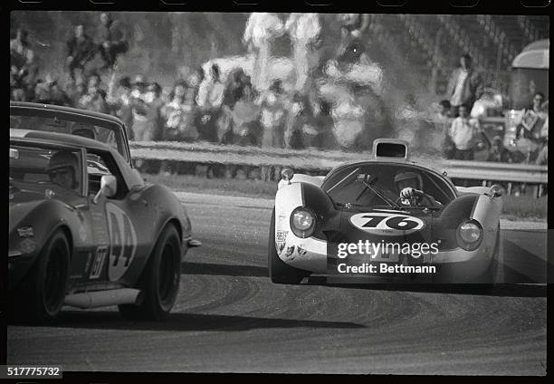 The first of its kind ever to enter international competition, a Homwet turbine-powered car is shown as driver Dick Thompson maneuvers it through one...