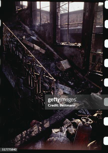 Fire-charred interior of one of the buildings of Tokyo University after an 11-hour battle with police ended and the student radicals who had...