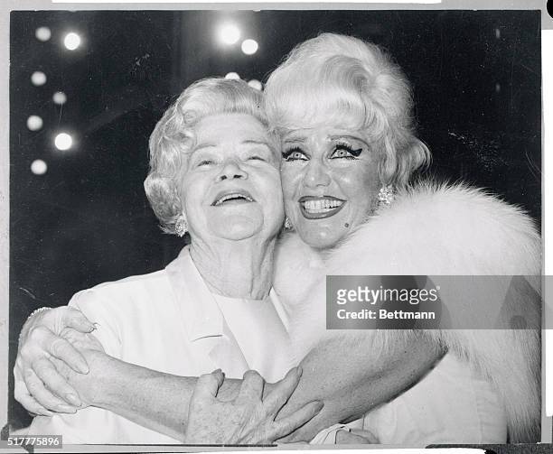 It's smiles all around as actress Ginger Rogers is congratulated by her mother, Lela Rogers, left, backstage at the Theatre Royal late February 20th...