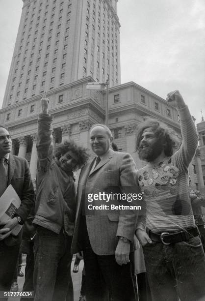 Accompanied by attorney William Kunstler , Abbie Hoffman, Dave Dellinger, and Jerry Rubin arrive at U.S. Court House here March 22nd to face charges...