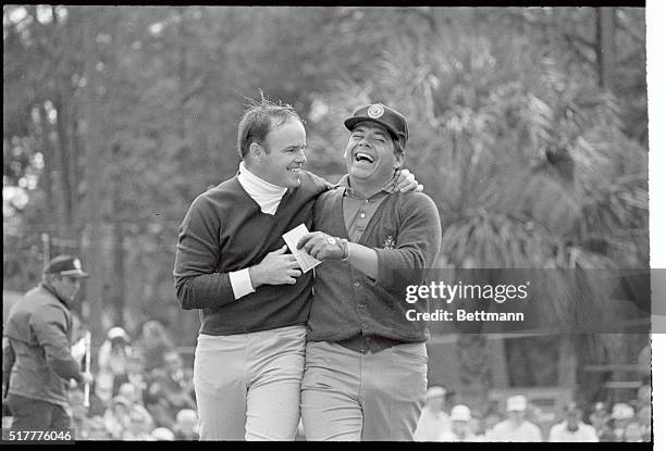 Jim Colbert and Lee Trevino walk away from the 18th after Colbert won the twice delayed Monsanto Open with a 17 under 267. Travino placed 3rd.