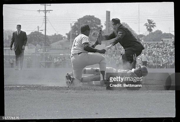 Sarasota, Florida: White Sox Tommy McCraw is out at third after driving in two runs in first inning. Boston's Joe Foy makes the tag on the throw from...