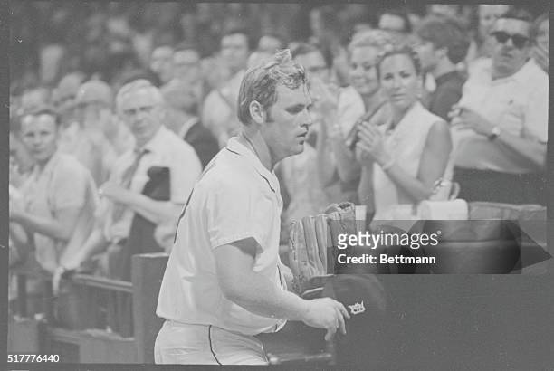 Detroit: Tiger pitcher Denny McLain steps into the Tigers dugout after being pulled from the game with the Yankees 7/1 in the sixth inning at Tiger...