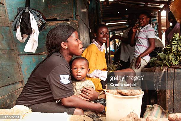 african people on the vegetables market, kumasi, ghana - ghanaian family bildbanksfoton och bilder
