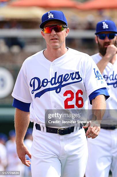 Chase Utley of the Los Angeles Dodgers walks to the dugout prior to the spring training game against the Arizona Diamondbacks at Camelback Ranch on...