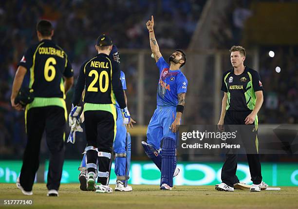 Virat Kohli of India celebrates victory during the ICC WT20 India Group 2 match between India and Australia at I.S. Bindra Stadium on March 27, 2016...