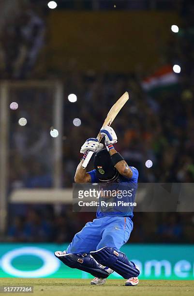 Virat Kohli of India celebrates victory during the ICC WT20 India Group 2 match between India and Australia at I.S. Bindra Stadium on March 27, 2016...