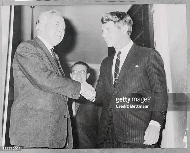 British Prime Minister Harold Wilson, , and Senator Robert F. Kennedy, , shake hands following their two hour meeting at 10 Downing Street. Kennedy...