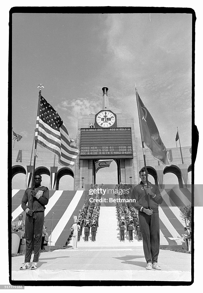 Bob Hayes Carrying US Flag at Track Meet