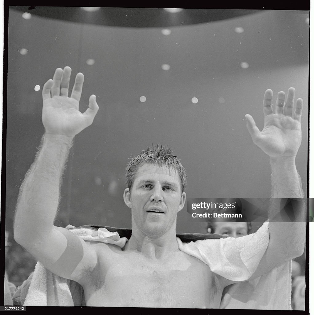 Jerry Quarry Raising Hands in Victory